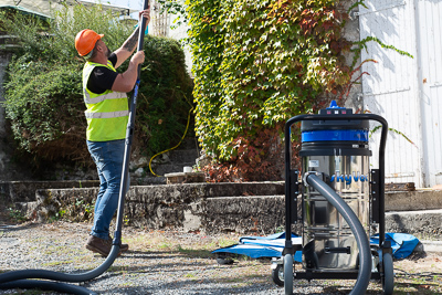 Gutter cleaning using SkyVac equipment