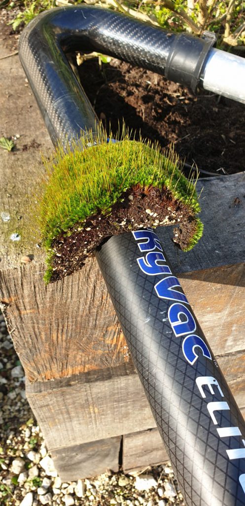Gutter Cleaning Moss-collecting-in-rooftile-gulleys_SKYVAC